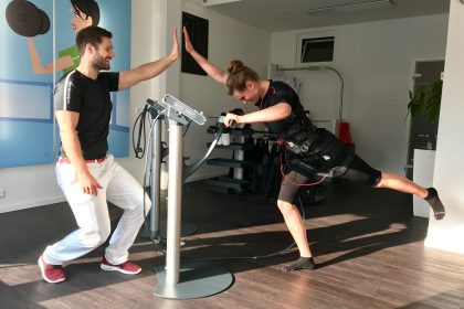 Person wearing EMS training suit during 20-minute workout